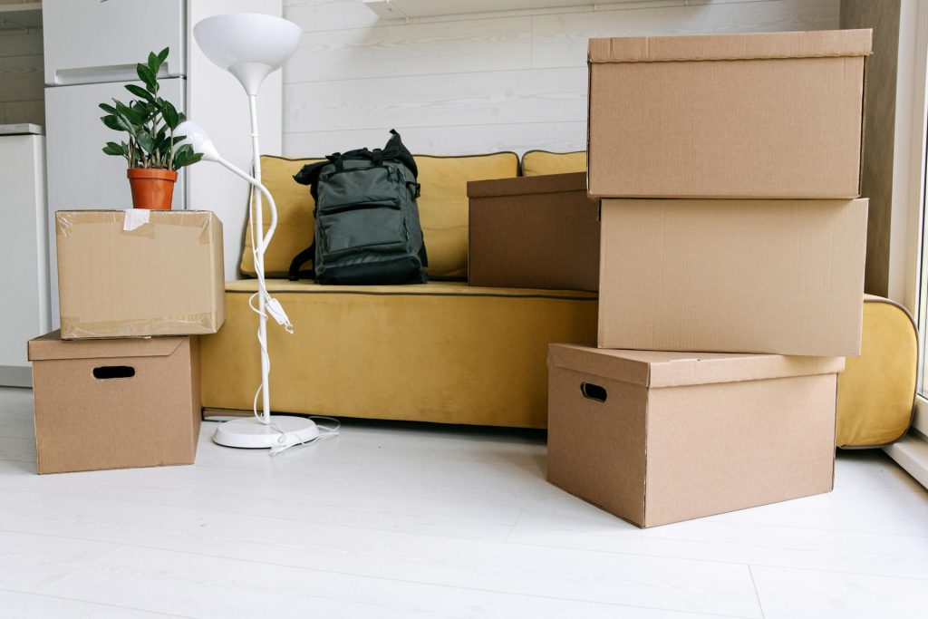 Back Savers moving crew carefully handling furniture during a local move in Medford, Oregon